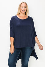 Load image into Gallery viewer, Solid top featuring a round neck, three quarter sleeves, and a high-low hem
